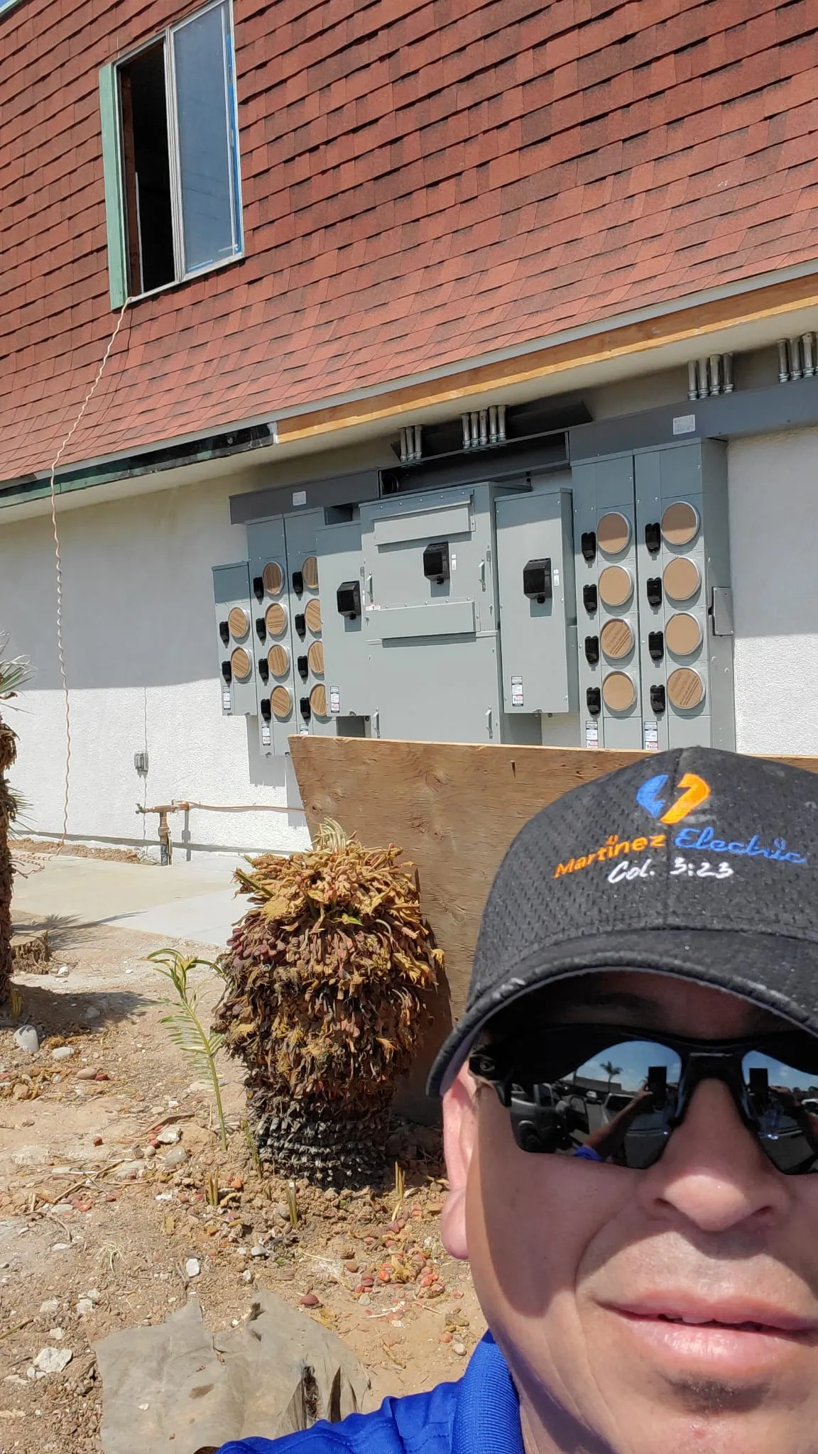 Vicente of Martinez Electric Corp on-site at a multi-meter bank installation